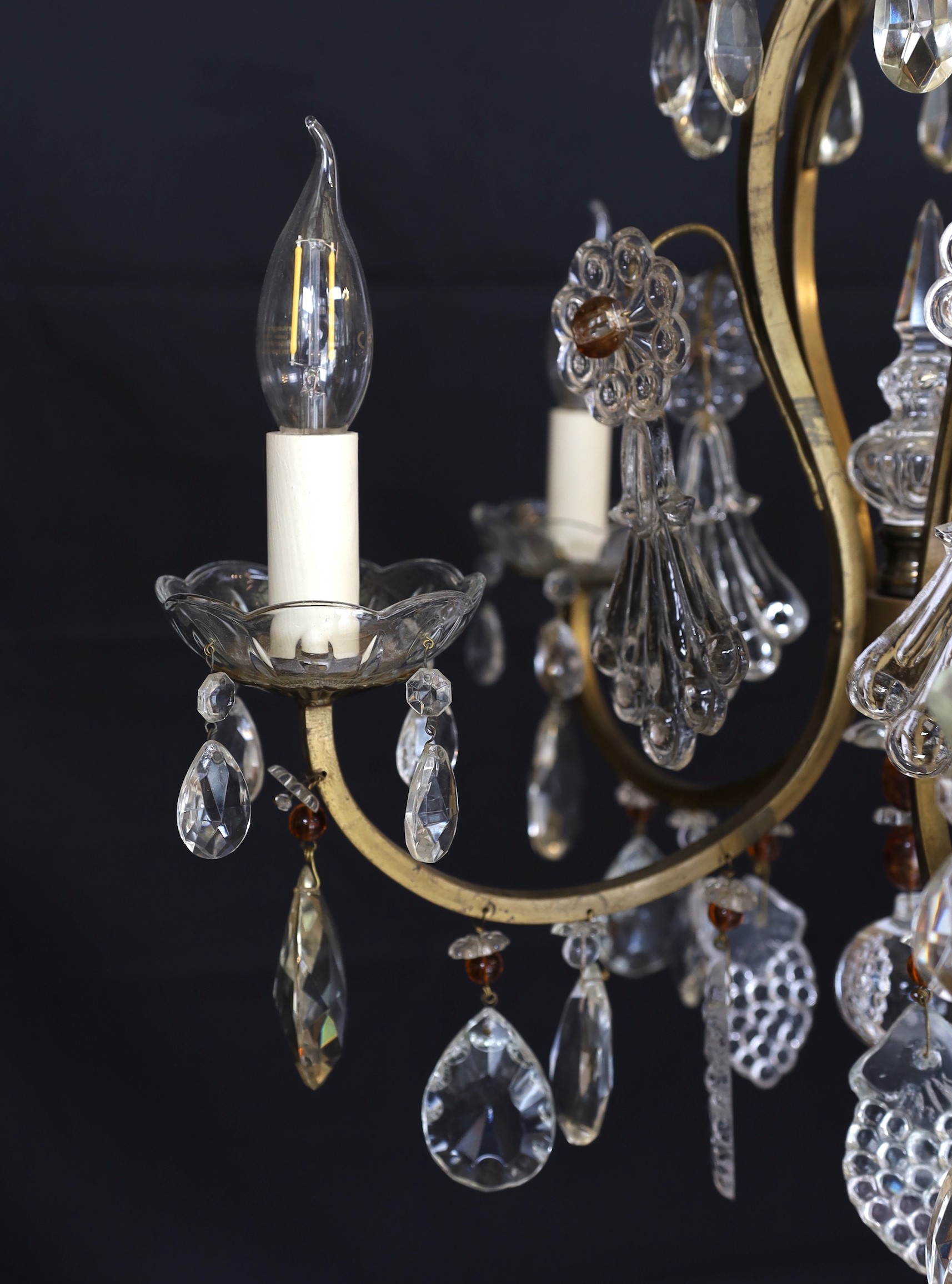 An early 20th century French bronzed metal and glass drop five light chandelier, height 63cm. width 48cm